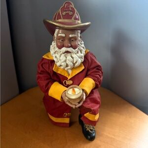 Festive Firefighter Santa Figurine - Red and Yellow